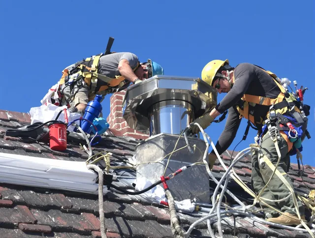 Protective chimney cap installed by Stoneham Chimney Sweep in Stoneham, MA